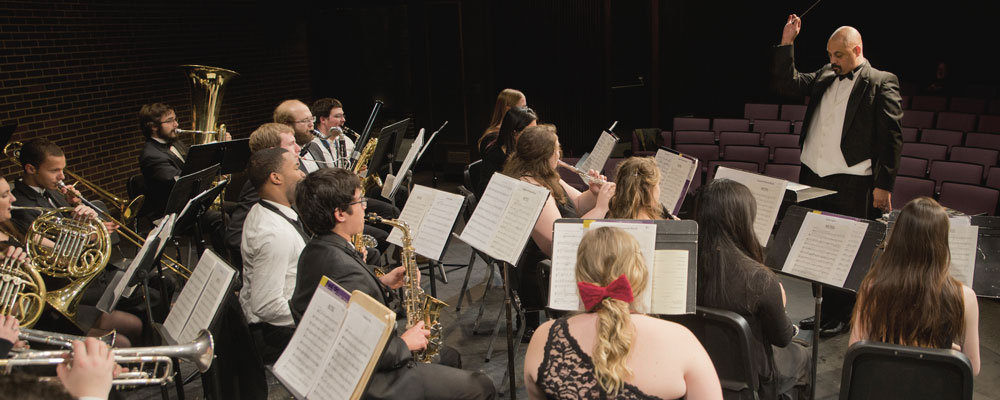 ICC Concert Band, under the direction of Professor Anthony Jones, practice in the Performing Arts Center.